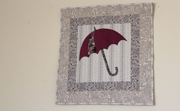 http://alwaysexpectmoore.com/wp-content/uploads/2014/11/wall-hanging-umbrella.jpg