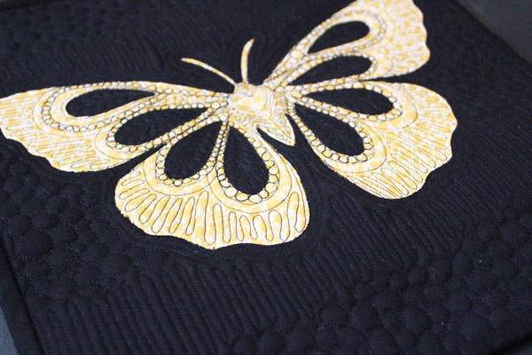 http://alwaysexpectmoore.com/wp-content/uploads/2015/05/close-up-of-butterfly-quilt.jpg