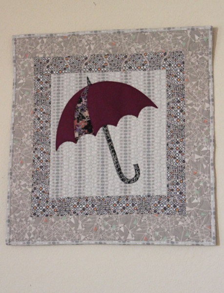 Umbrella applique wall hangning