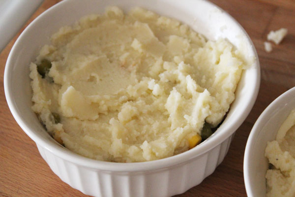 cover with mashed potatoes