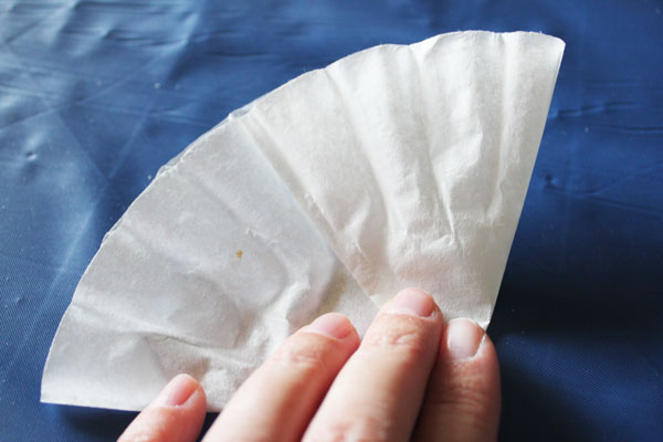 fold coffee filter into thirds