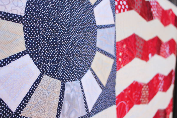 close up of Glory scrappy flag quilt