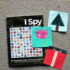 I spy foundation paper piecing book and three stitched blocks - a tree, tulip, and gift quilt block