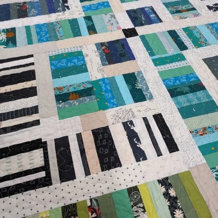Scrappy Portland Quilt by Seamingly Kate